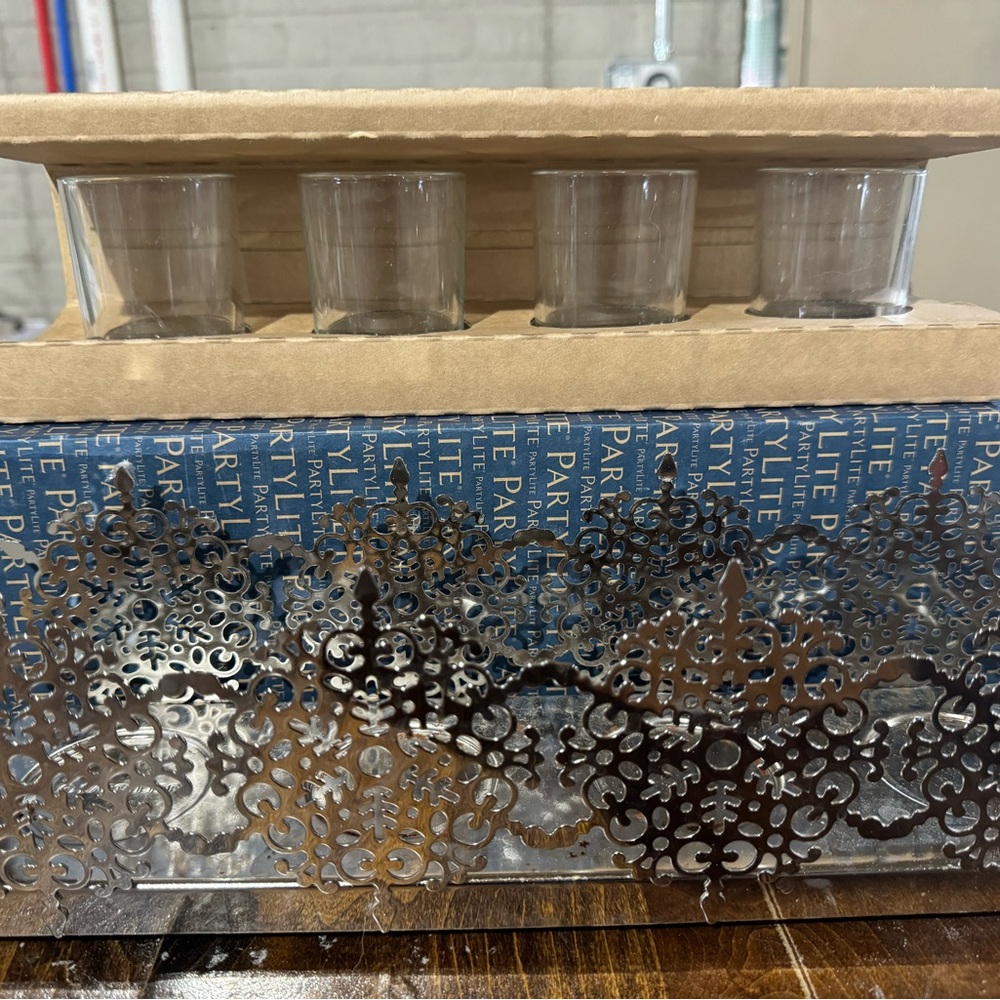 Partylite silvery snowflake votive candleholder.